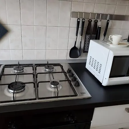 La Rocca Home, Accogliente Ad أرونا